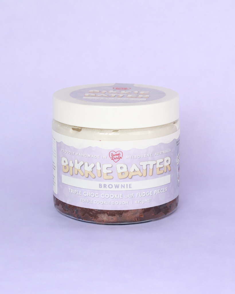 Jar of Bikkie Batter Brownie on a light purple background
