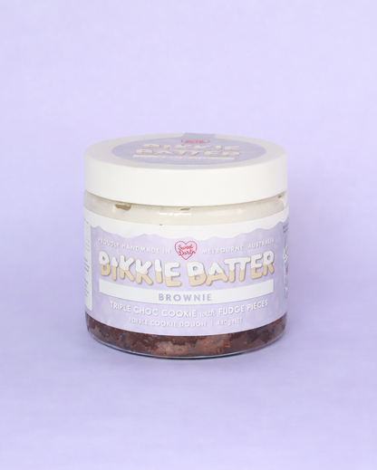 Jar of Bikkie Batter Brownie on a light purple background