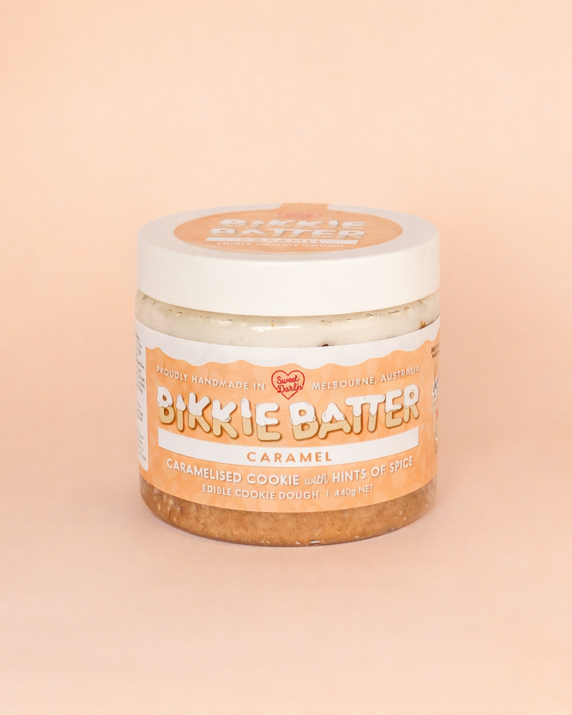 Jar of Bikkie Batter Caramel on a beige background