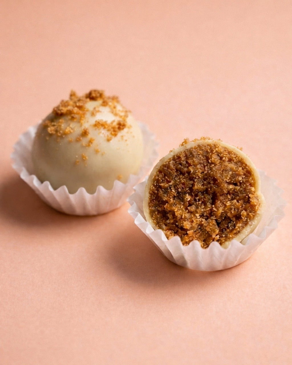 Caramel Biscoff bites feature a soft, doughy center inside a crisp chocolate shell