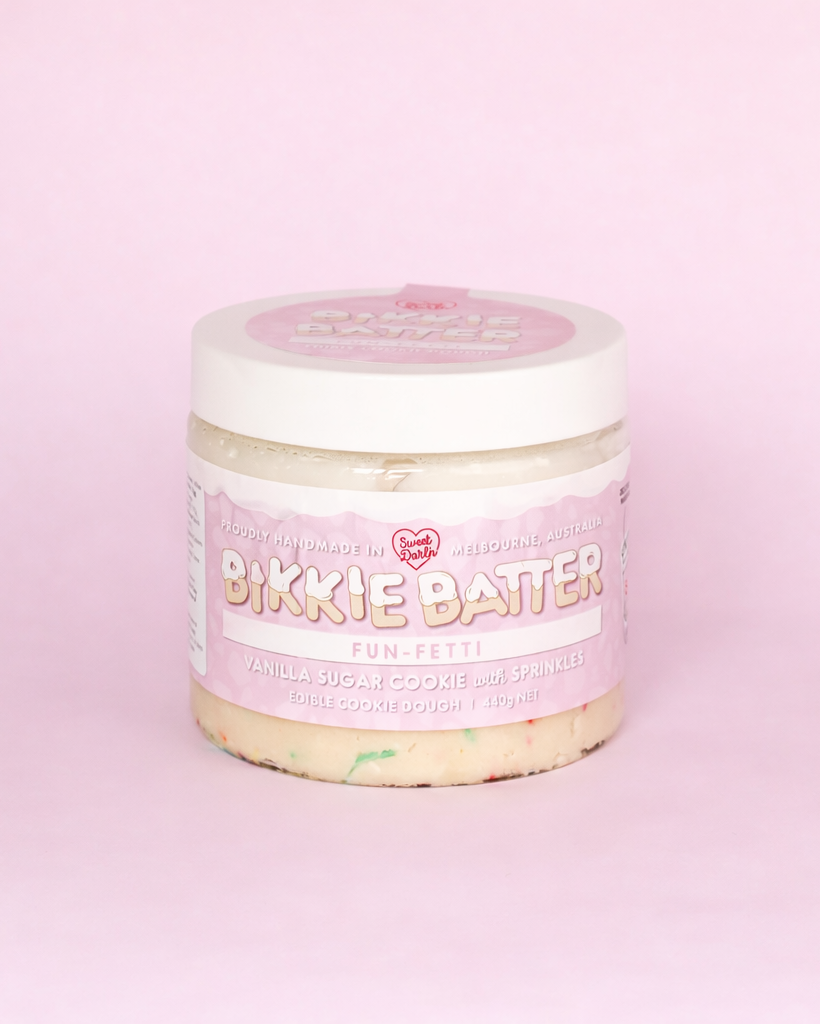 Jar of Bikkie Batter on a pink background